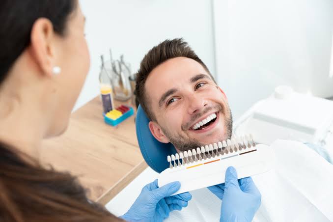 Dentist-supervised teeth whitening consultation using a tooth shade guide